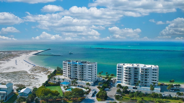 drone / aerial view featuring a view of the beach and a water view