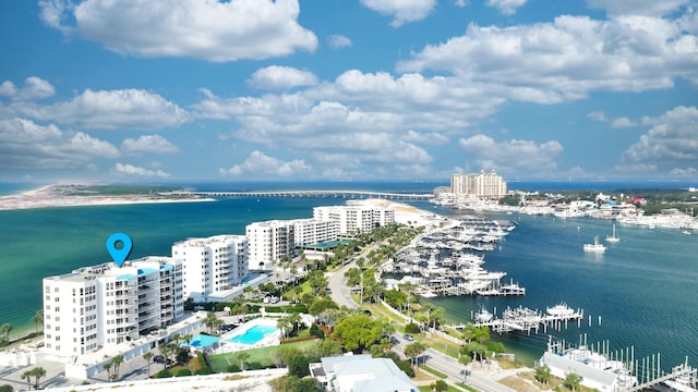 drone / aerial view with a view of city and a water view