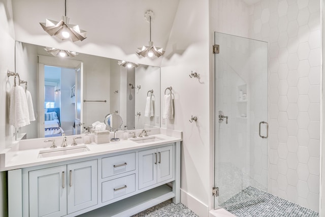 bathroom with vanity and an enclosed shower