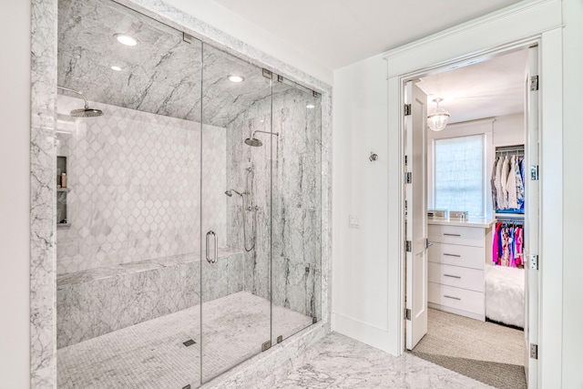 bathroom featuring an enclosed shower