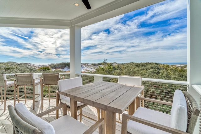 balcony featuring a water view