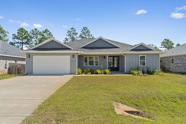 ranch-style house with a garage and a front lawn