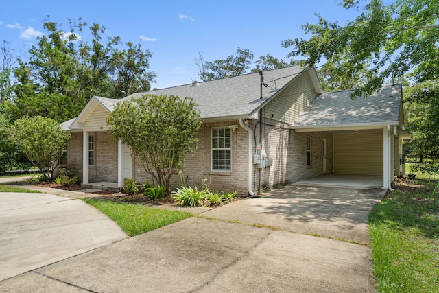 view of front of house with a carport