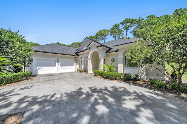 view of front of house with a garage