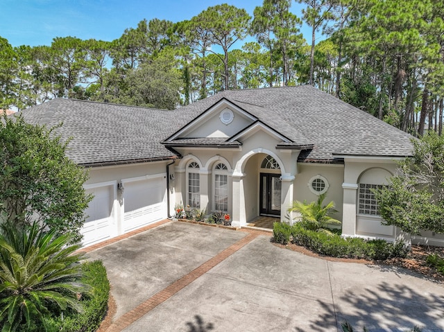 view of front of property featuring a garage