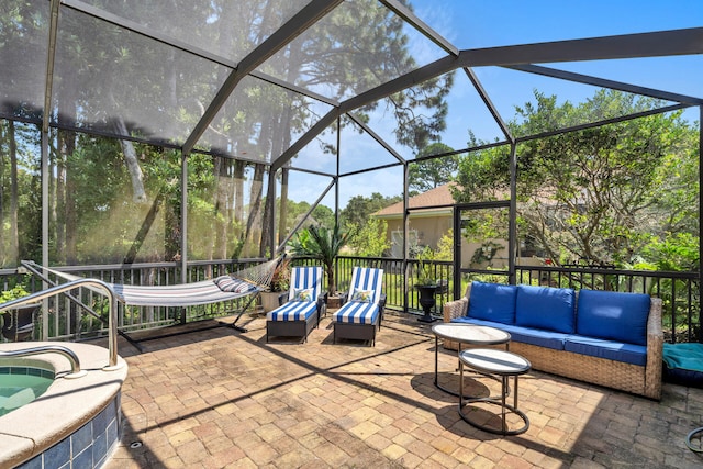 view of patio / terrace with a lanai and outdoor lounge area