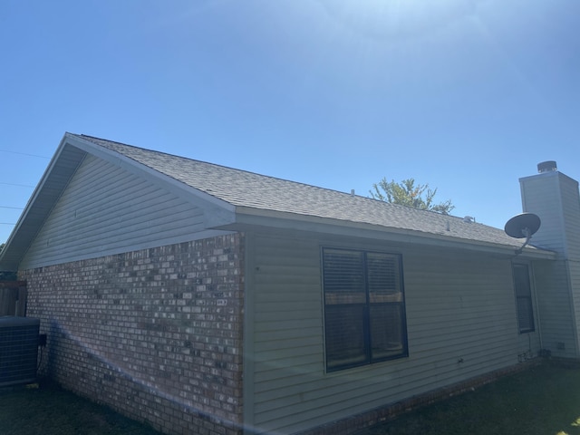 view of property exterior with central air condition unit