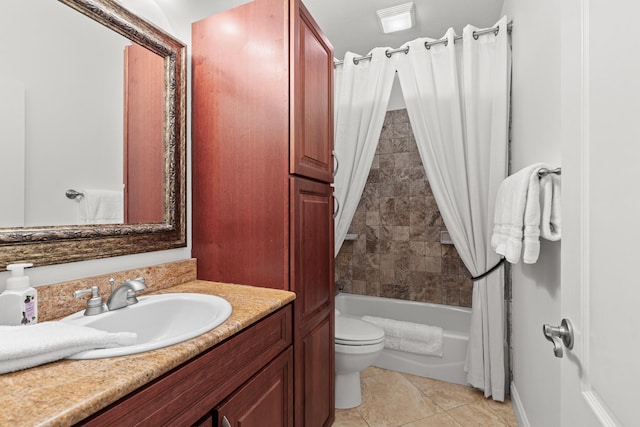 full bathroom with tile patterned flooring, vanity, shower / bath combo with shower curtain, and toilet