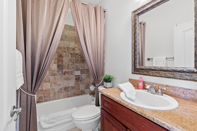 full bathroom featuring toilet, vanity, and shower / bath combo with shower curtain