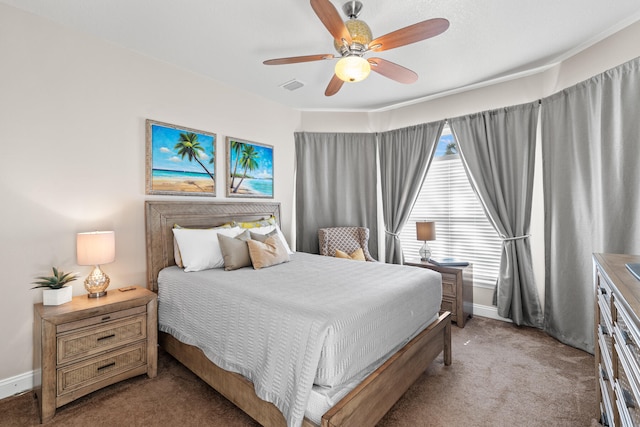 bedroom featuring ceiling fan and light carpet