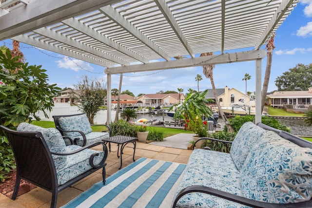 view of patio featuring a water view and a pergola