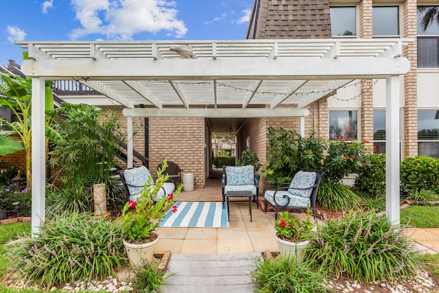 view of patio / terrace featuring a pergola