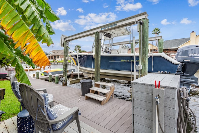 view of dock with a water view