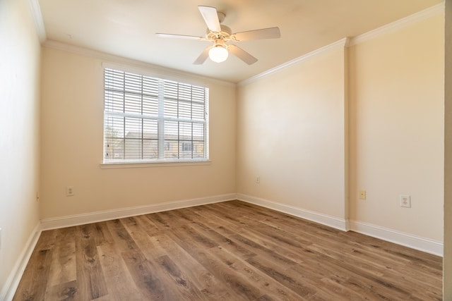 unfurnished room with ornamental molding, hardwood / wood-style flooring, and ceiling fan