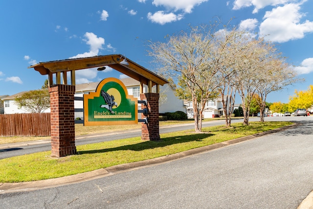 surrounding community featuring a lawn