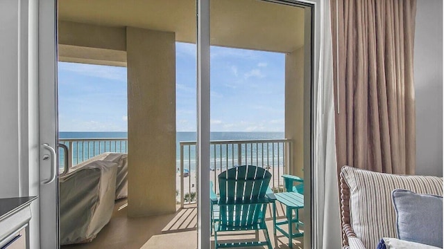 balcony featuring a water view