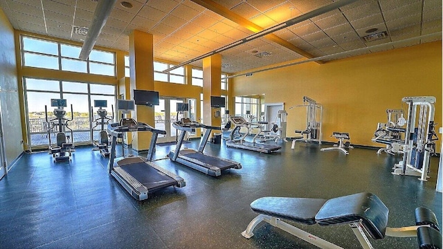 gym featuring a paneled ceiling