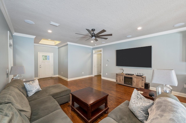 2137 Janet St, Navarre, FL 32566 - living room with wood finished floors, ceiling fan, recessed lighting, a textured ceiling, and ornamental molding