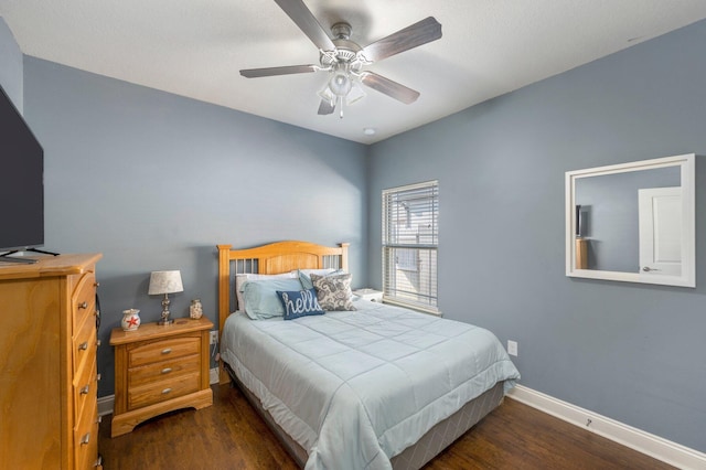 2137 Janet St, Navarre, FL 32566 - bedroom with wood finished floors, baseboards, and a ceiling fan