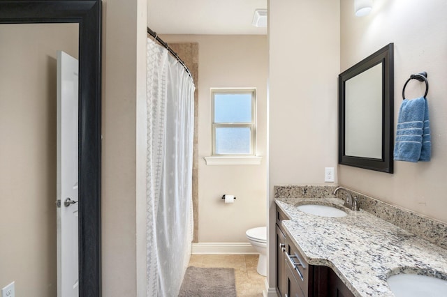 2137 Janet St, Navarre, FL 32566 - full bathroom featuring toilet, vanity, baseboards, tile patterned floors, and a shower with shower curtain