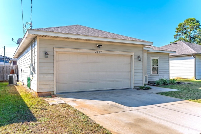 exterior space with cooling unit, driveway, and fence