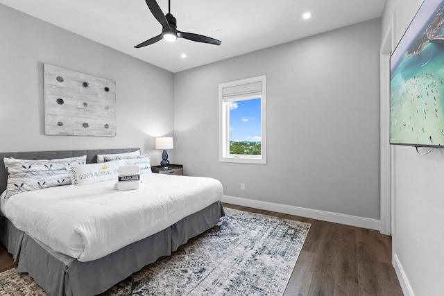 bedroom featuring dark wood-type flooring and ceiling fan