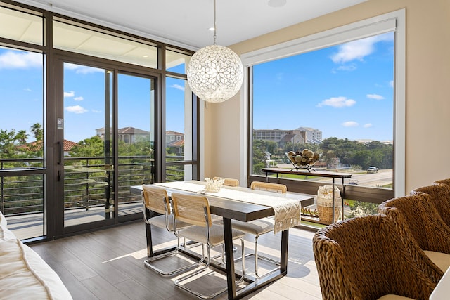 sunroom featuring a wealth of natural light