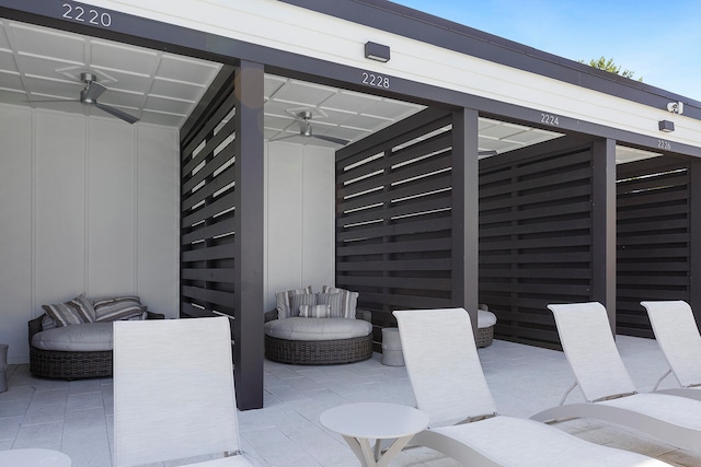 view of patio / terrace featuring ceiling fan