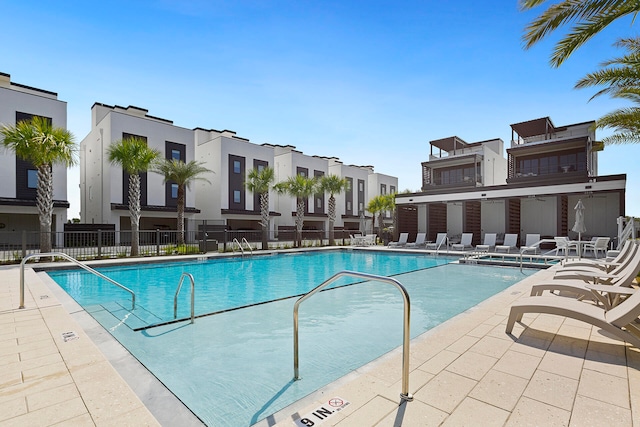 view of swimming pool with a patio