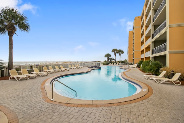 view of pool featuring a patio