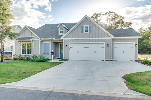 craftsman-style house with a front yard