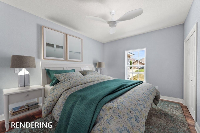 bedroom featuring a closet, ceiling fan, hardwood / wood-style flooring, and a textured ceiling