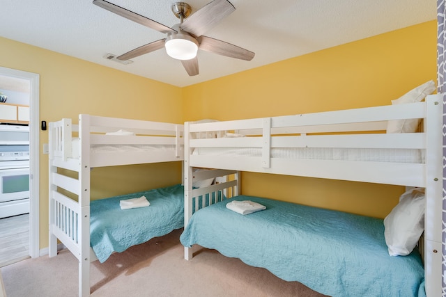 bedroom featuring carpet and ceiling fan