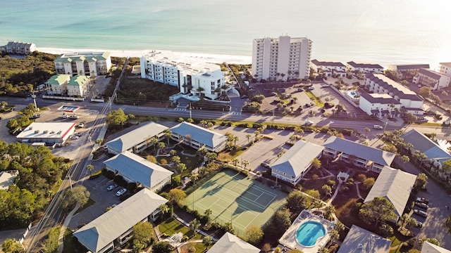 aerial view featuring a water view and a beach view