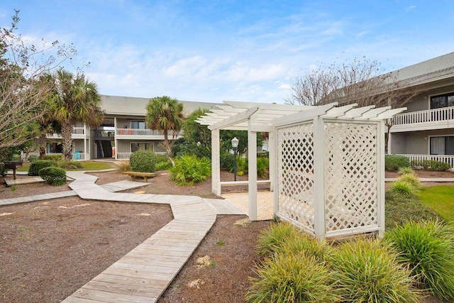 view of home's community with a pergola