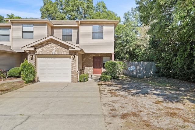 view of front of property with a garage