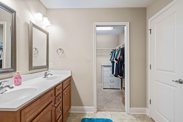 bathroom featuring vanity and tile patterned flooring