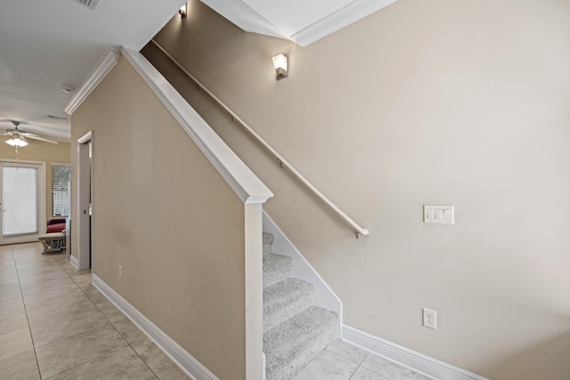 stairway featuring ornamental molding, tile patterned floors, and ceiling fan