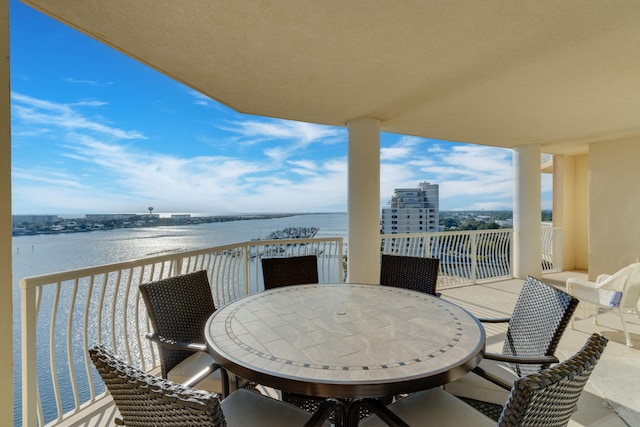 balcony featuring a water view