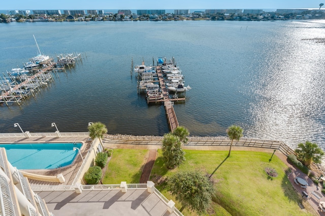 birds eye view of property with a water view