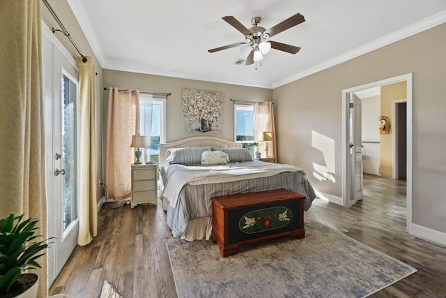 bedroom with ornamental molding, dark wood-type flooring, and ceiling fan