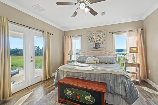 bedroom featuring french doors, multiple windows, and access to exterior