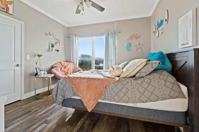 bedroom featuring crown molding, ceiling fan, and dark hardwood / wood-style flooring