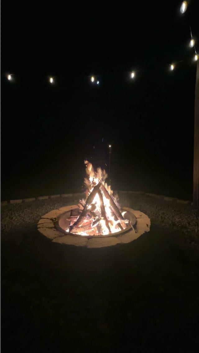 exterior details with a fire pit