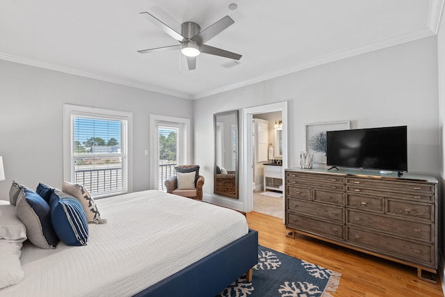 bedroom with crown molding, ensuite bathroom, light wood-type flooring, and ceiling fan