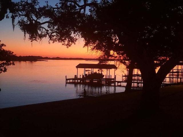 view of dock with a water view