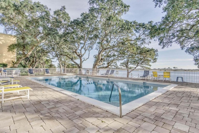 209 W Miracle Strip Pkwy Unit J201, Mary Esther, FL 32569 - community pool featuring fence and a patio area