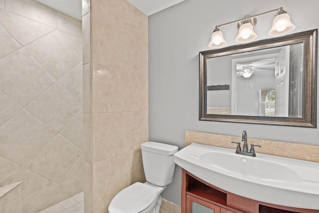 bathroom with vanity, ceiling fan, and toilet