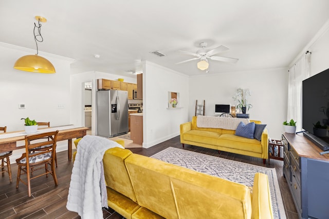 living room featuring ornamental molding, dark hardwood / wood-style floors, and ceiling fan