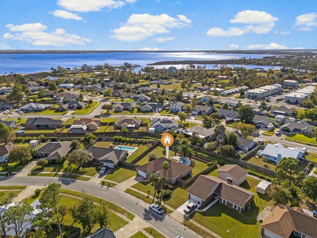 drone / aerial view with a water view